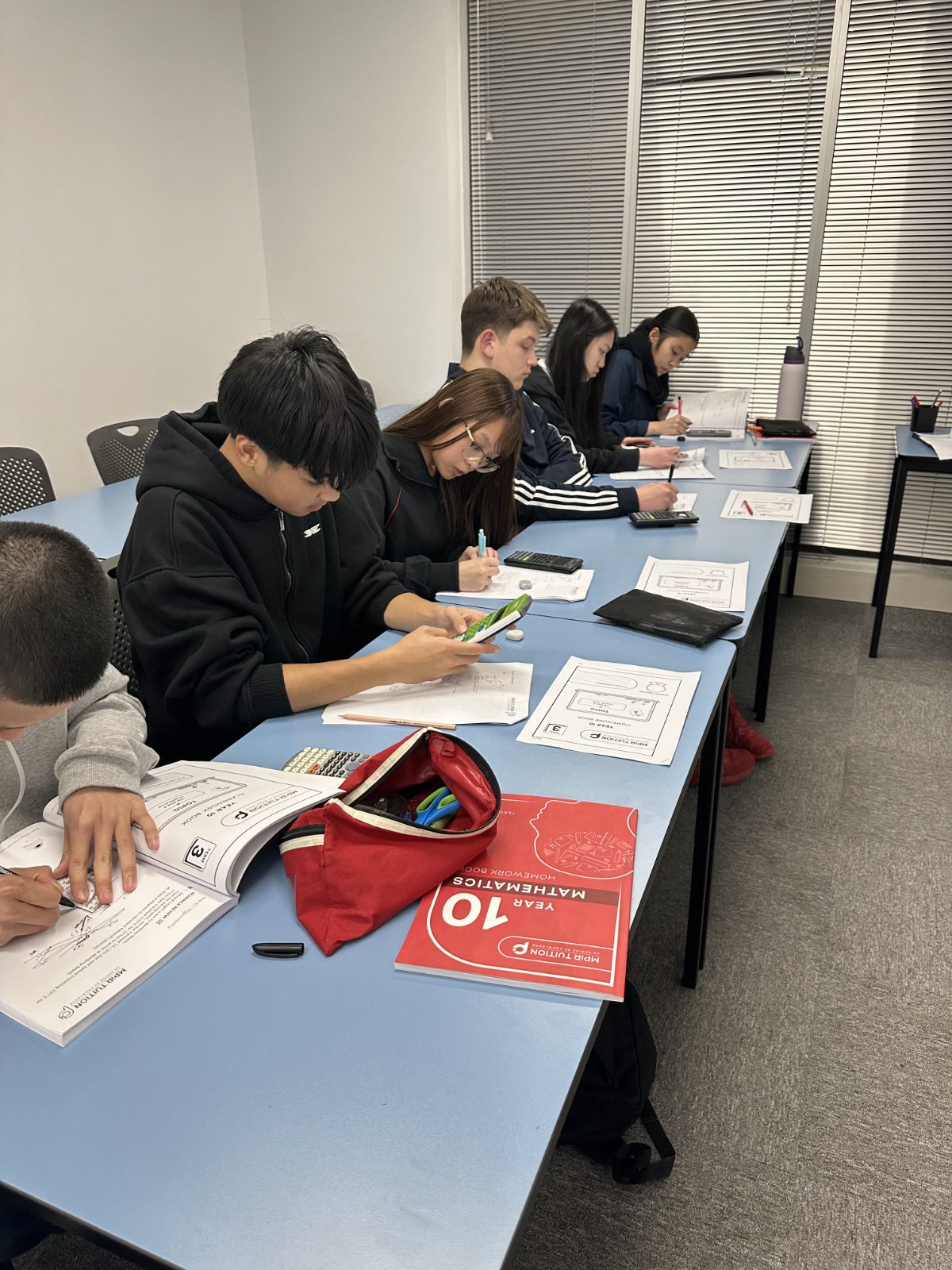 Senior Signal Education students working through exam-style questions
